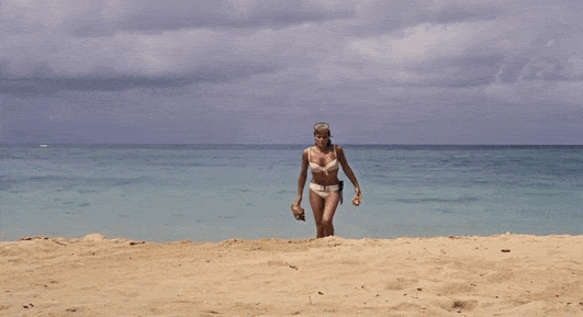Ursula Andress as the first Bond girl in Dr No on the beach in her famous white bikini