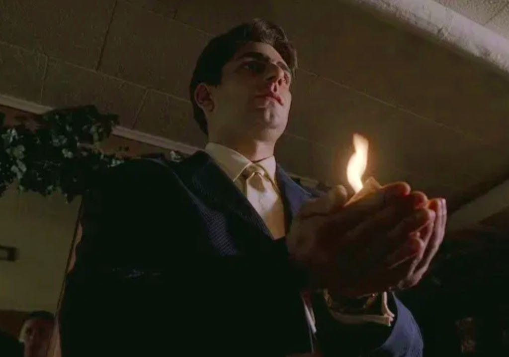 Christopher Moltisanti (Michael Imperioli) swears an oath to Tony Soprano