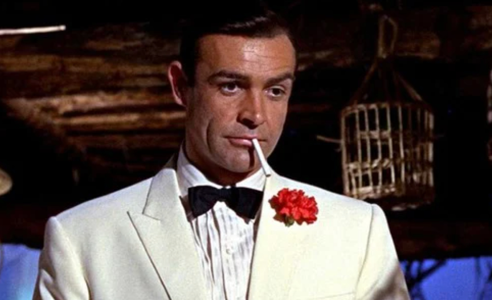 Sean Connery in Goldfinger wearing a signature white tuxedo