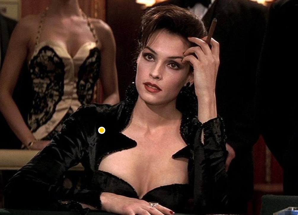 Famke Janssen stars as a 007 Bond Villain who squeezes opponents to death with her legs