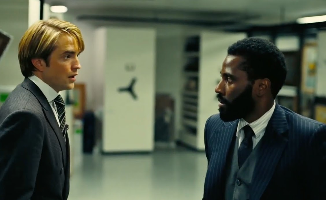 Neil (Robert Pattinson) and The Protagonist (John David Washington) at the airport in Tenet