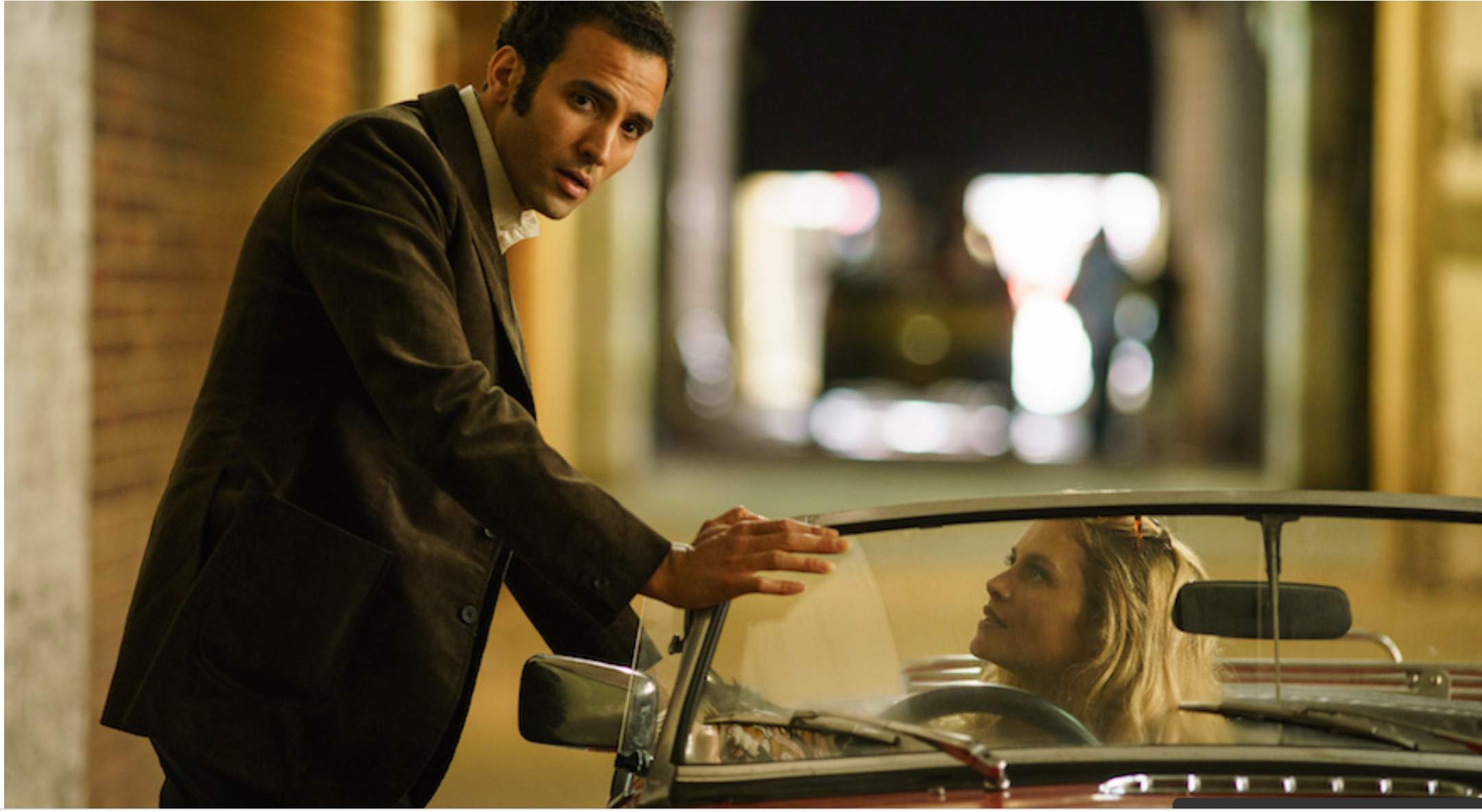 Actor Marwan Kenzari leans on a car while starring as spy Ashraf Marwan in The Angel, a movie about an Egyptian billionaire