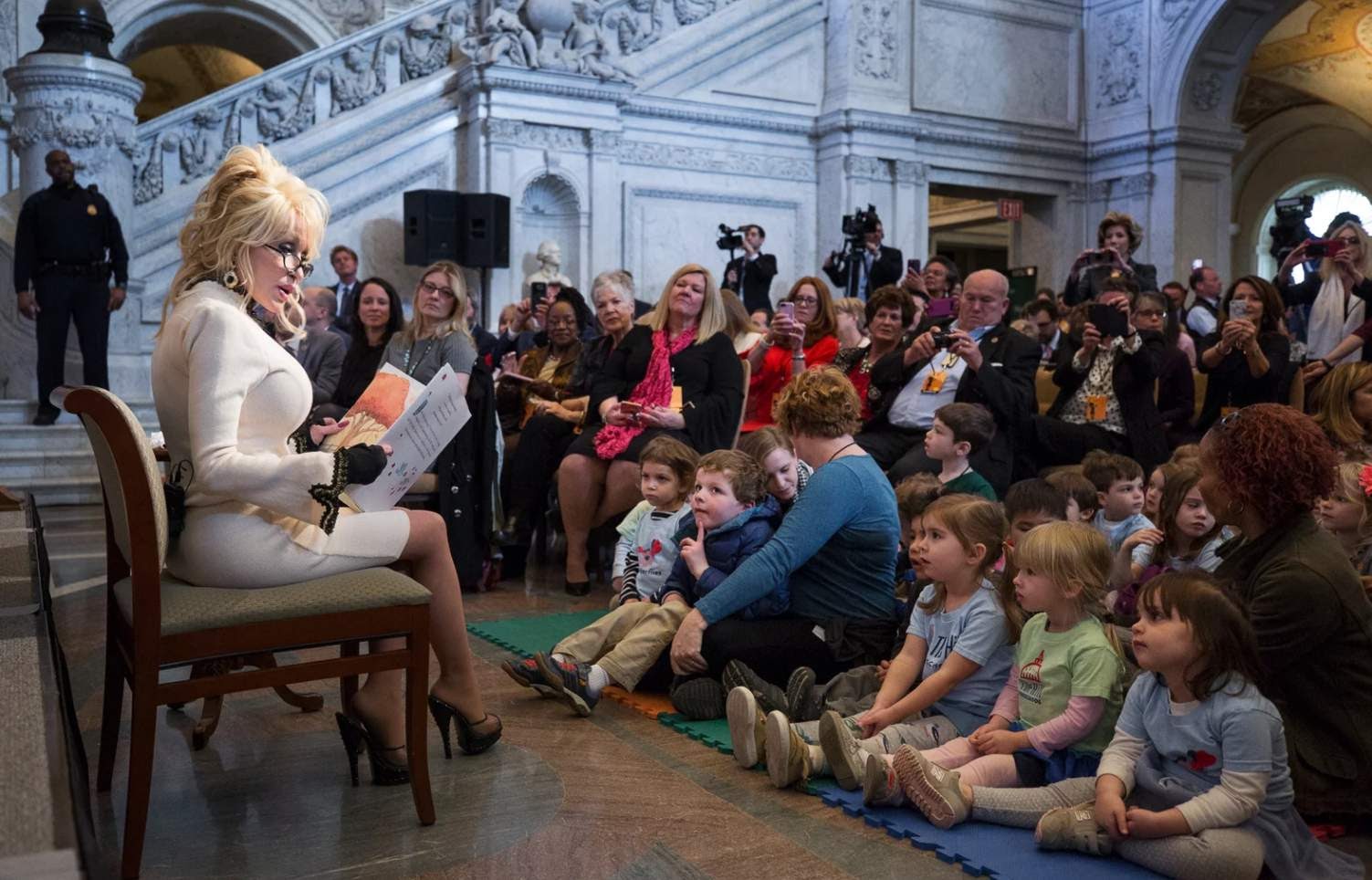 Dolly Parton, country music superhero, supports literacy charties