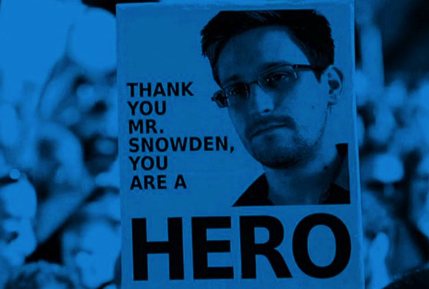 Edward Snowden: Privacy hero or dangerous traitor? Some demonstrators hold thank you signs while others believe he is a traitor.