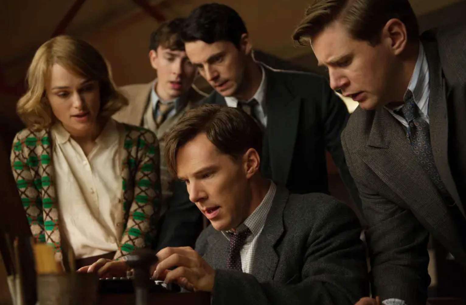 Benedict Cumberbatch (center) stars as British cryptologist Alan Turing in The Imitation Game