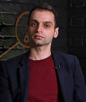 Konstantin Kisin is a Russian-British comedian and political commentator. Kisin regularly writes for a number of publications including The Spectator and Standpoint. He has co-hosted the YouTube channel Triggernometry since 2018.