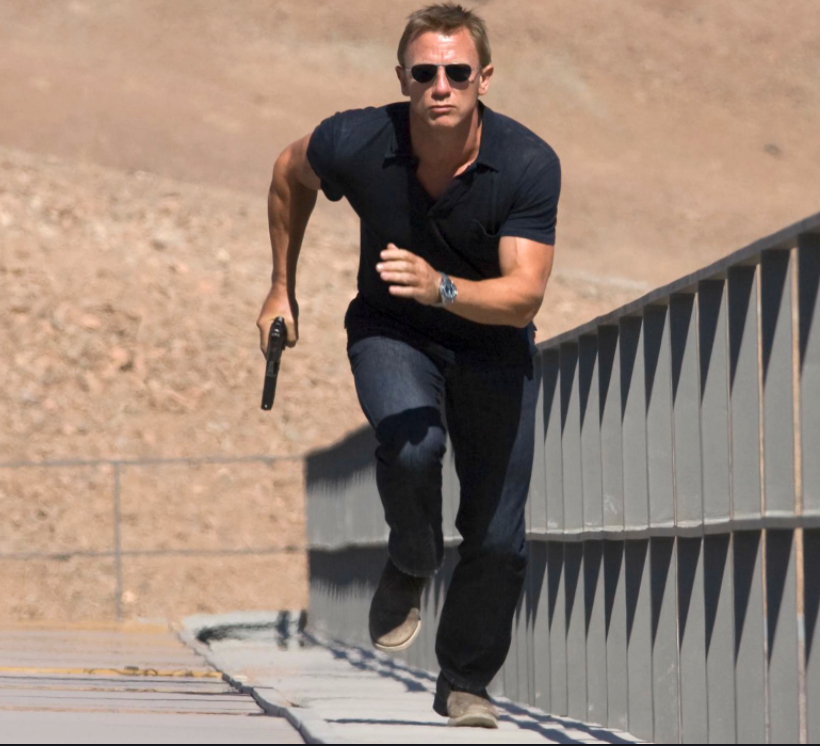 Action man Daniel Craig runs the steps as James Bond
