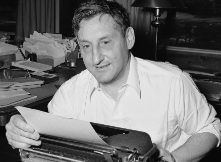 A photo of Screenwriter John Howard Lawson at his typewriter