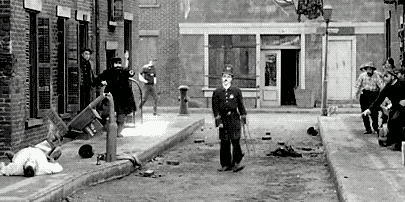 Charlie Chaplin as a police officer