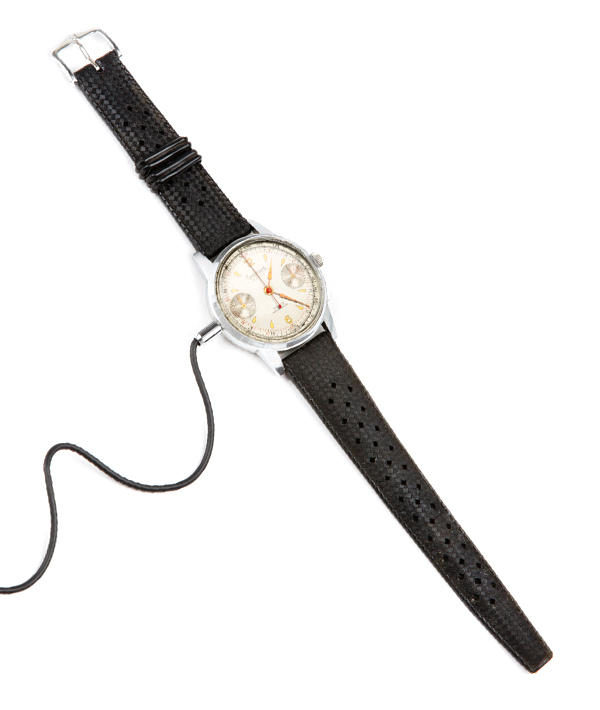This 1950s watch contains a hidden surveillance microphone. The case is perforated around the edges to collect sound, while the microphone wire runs up the wearer’s left arm. It was a dangerous but effective Cold War spy tool.