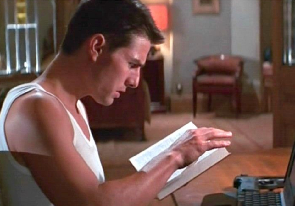 Tom Cruise reading a spy book