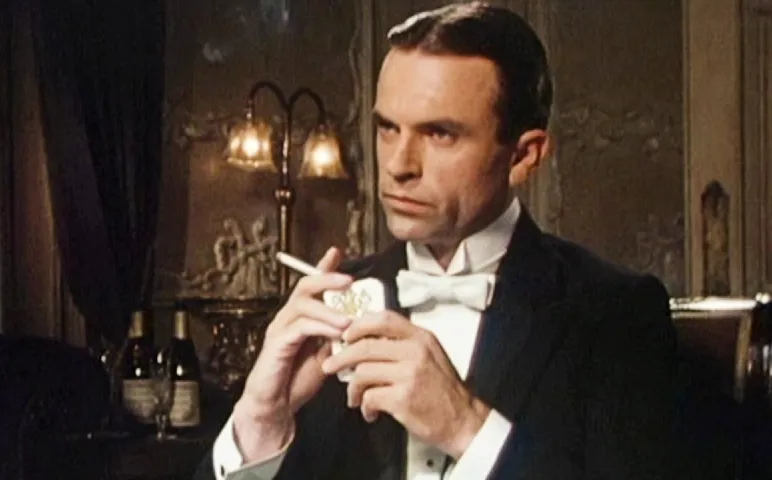 Sam Neill as Sydney Riley, super spy